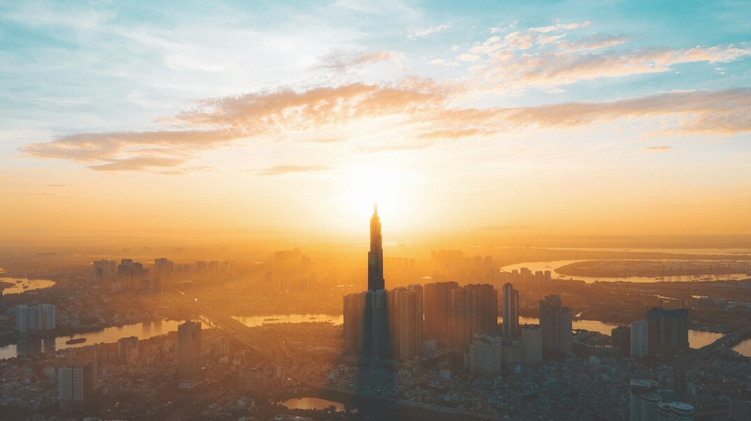 sunrise over city skyline